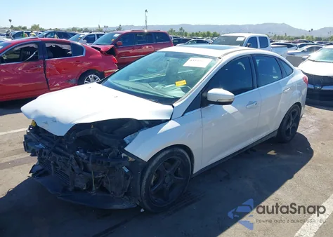 2014 Ford Focus Titanium from USA, damaged, VIN 1FADP3J20EL374876